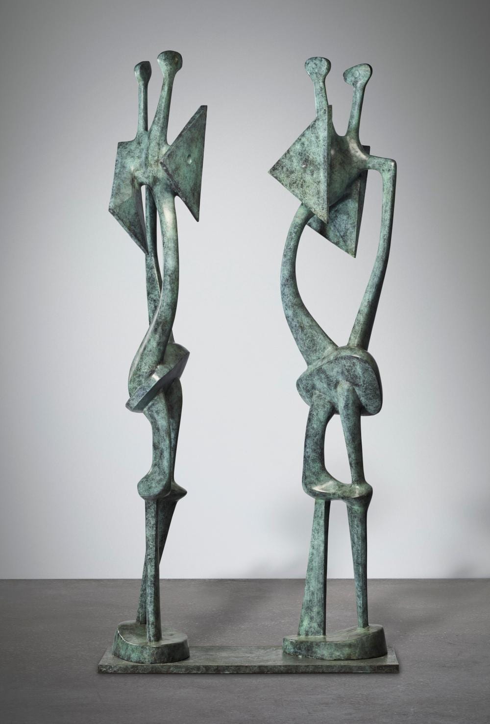 Henry Moore (1898-1986). Double Standing Figure. bronze with green patinaHe comparable sale