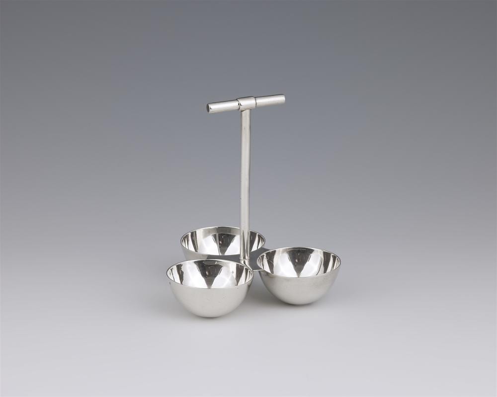Christopher Dresser comparable auction result: a small cruet designed by christopher dresser