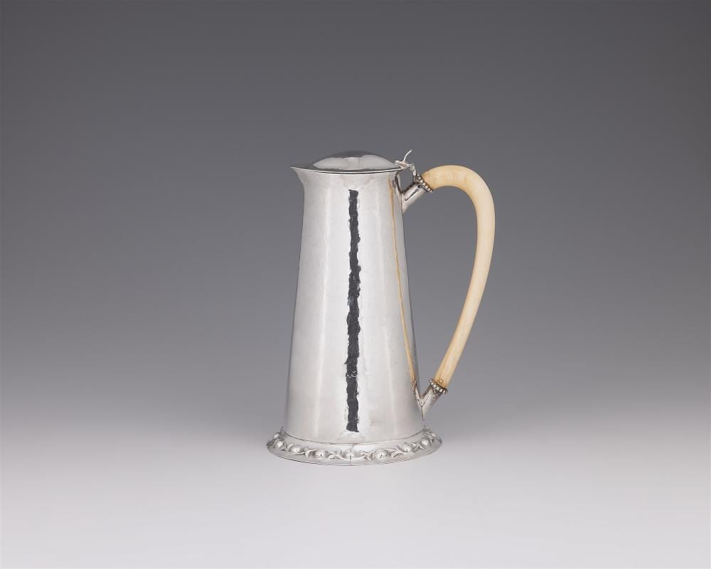 C. R. Ashbee comparable auction result: an arts and crafts silver water jug by charles robert ashbee