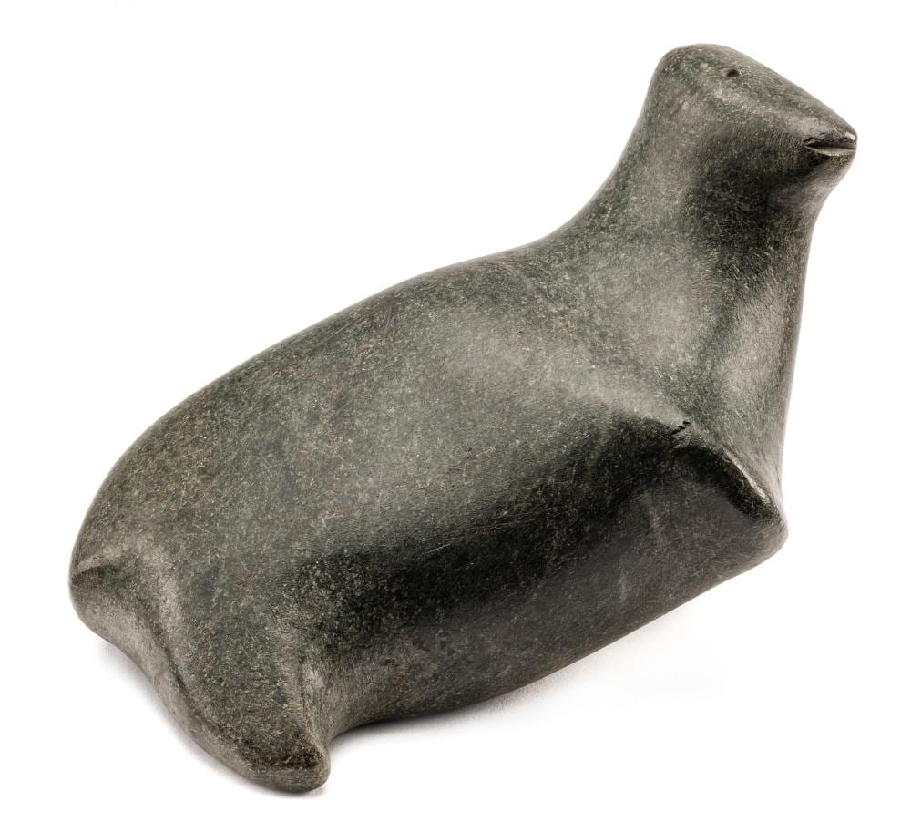 Andy Miki comparable auction result: andy miki inuit resting animal c 1965 68