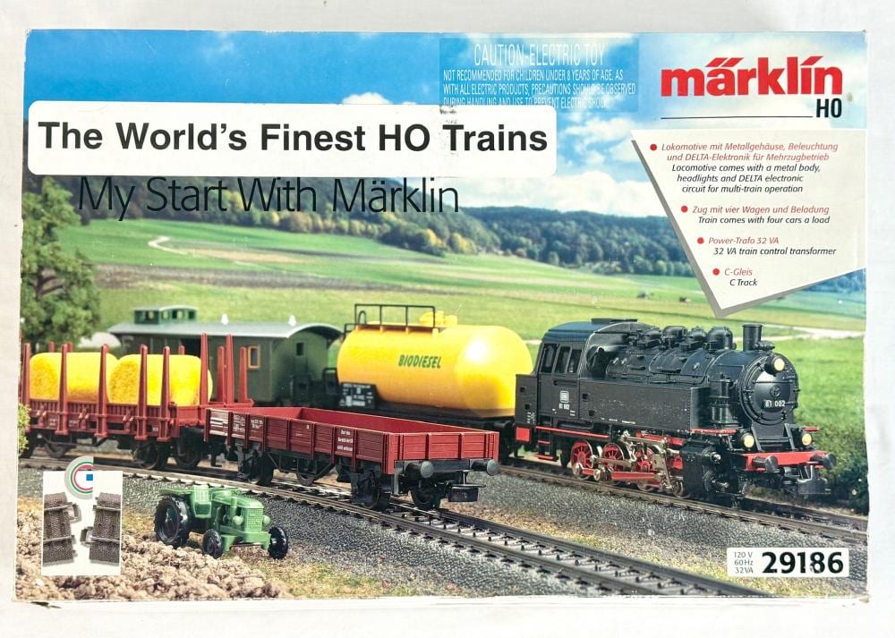 Märklin HO scale model train starter set box showing a locomotive pulling freight cars on a track.