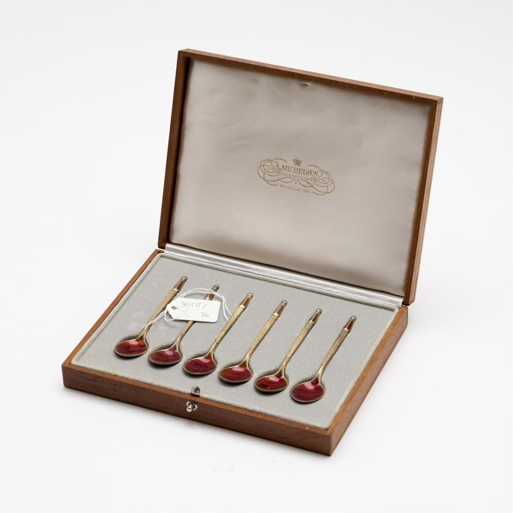 Anton Michelsen comparable auction result: a cased set of danish silver and red enamel demi tasse spoons by anton michelsen