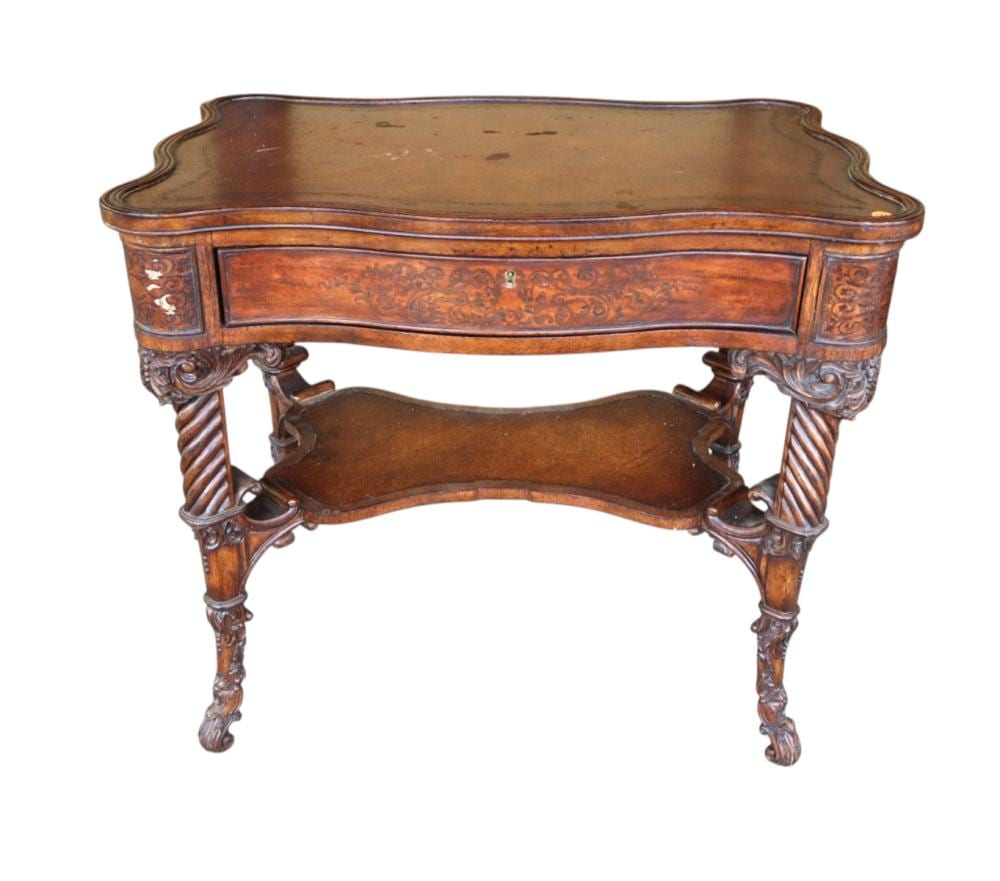 Theodore Alexander comparable auction result: fancy carved leather top inlaid table manner theodore alexander