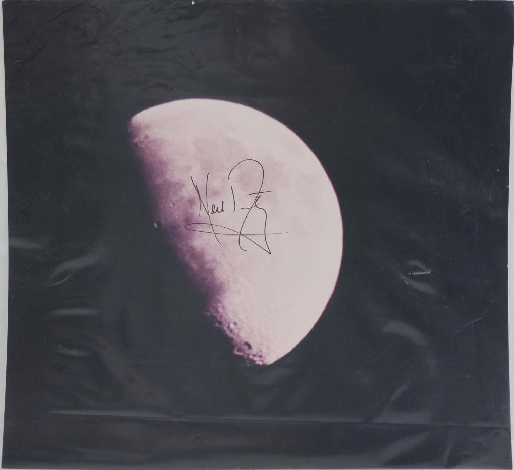 Neil Armstrong comparable auction result: neil armstrong signed vintage lunar photograph