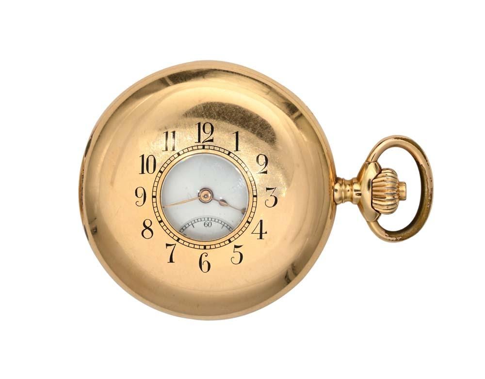 Cyrus Cuneo comparable auction result: cyrus gold pocket watch with bull s eye