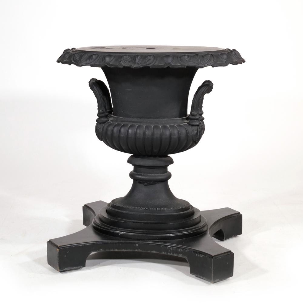 Robert Wood comparable auction result: robert wood co cast iron garden urn table base