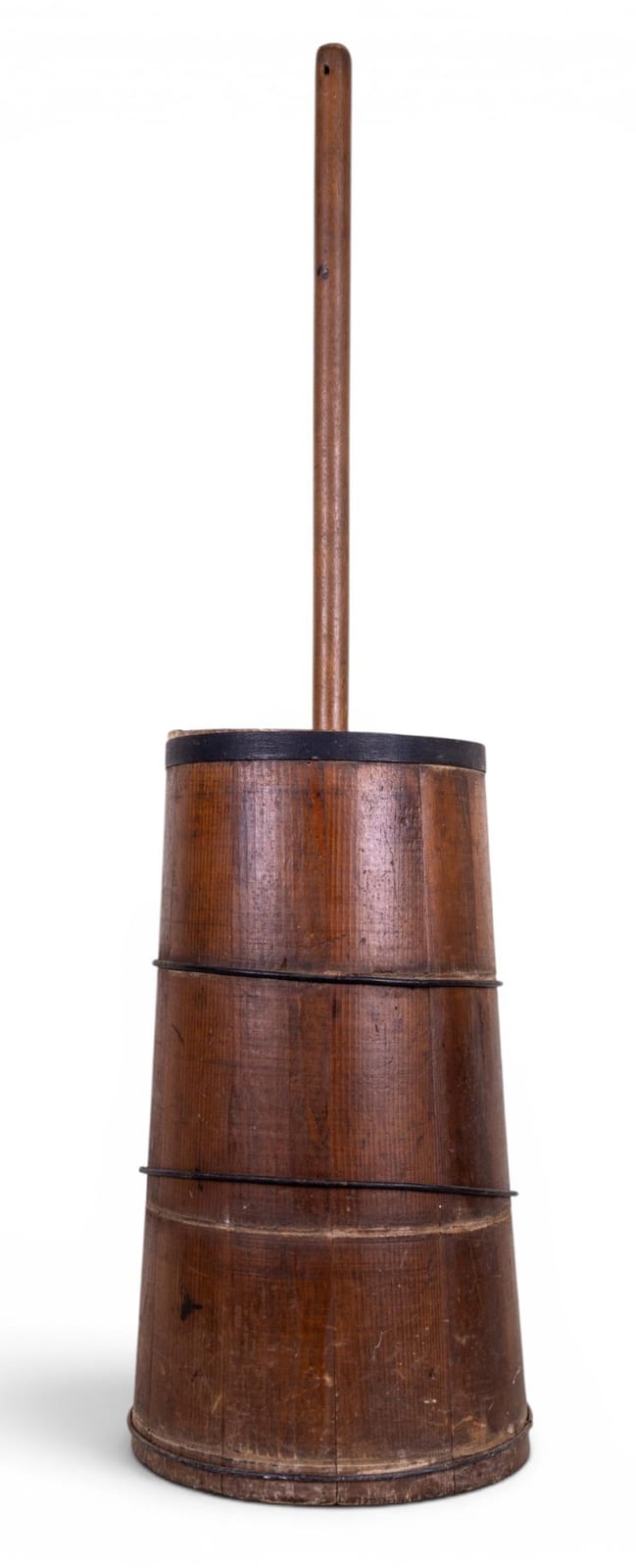 Wooden butter churn with a tall handle and stacked barrel sections, photographed against a white background.
