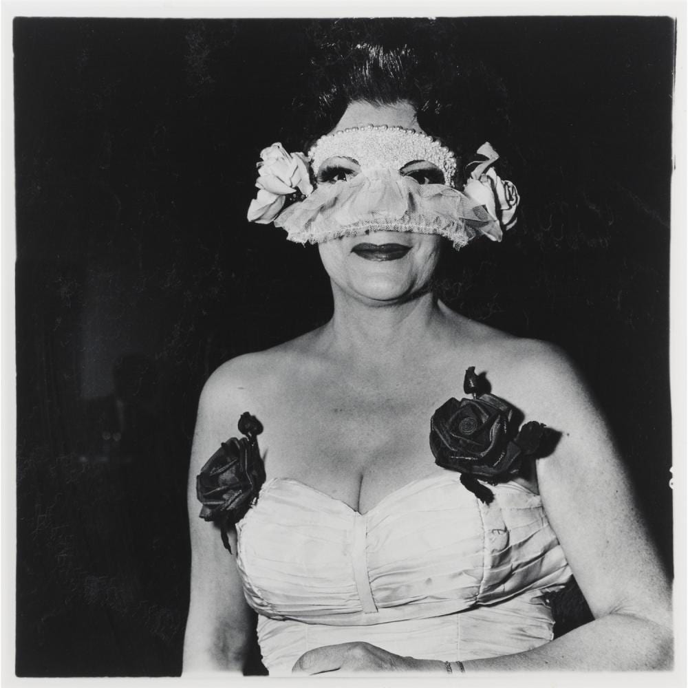 Diane Arbus comparable auction result: diane arbus 1923 1971 lady at a masked ball with two roses on her dress 1967 silver gelatin print printed later 37 5 x 37 5cm ima