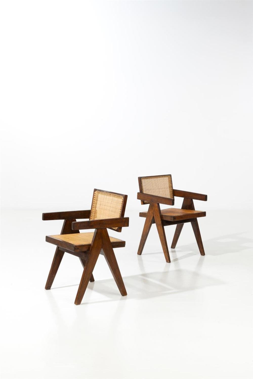 Pierre Jeanneret comparable auction result: pierre jeanneret 1896 1967 pair of office chairs