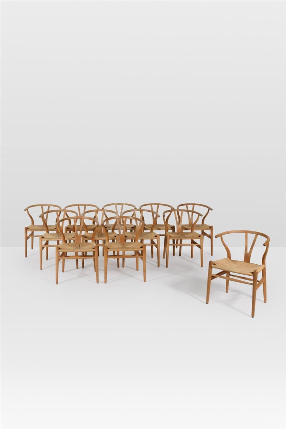 Hans J. Wegner comparable auction result: hans j wegner 1914 2007 set of twelve chairs model ch24