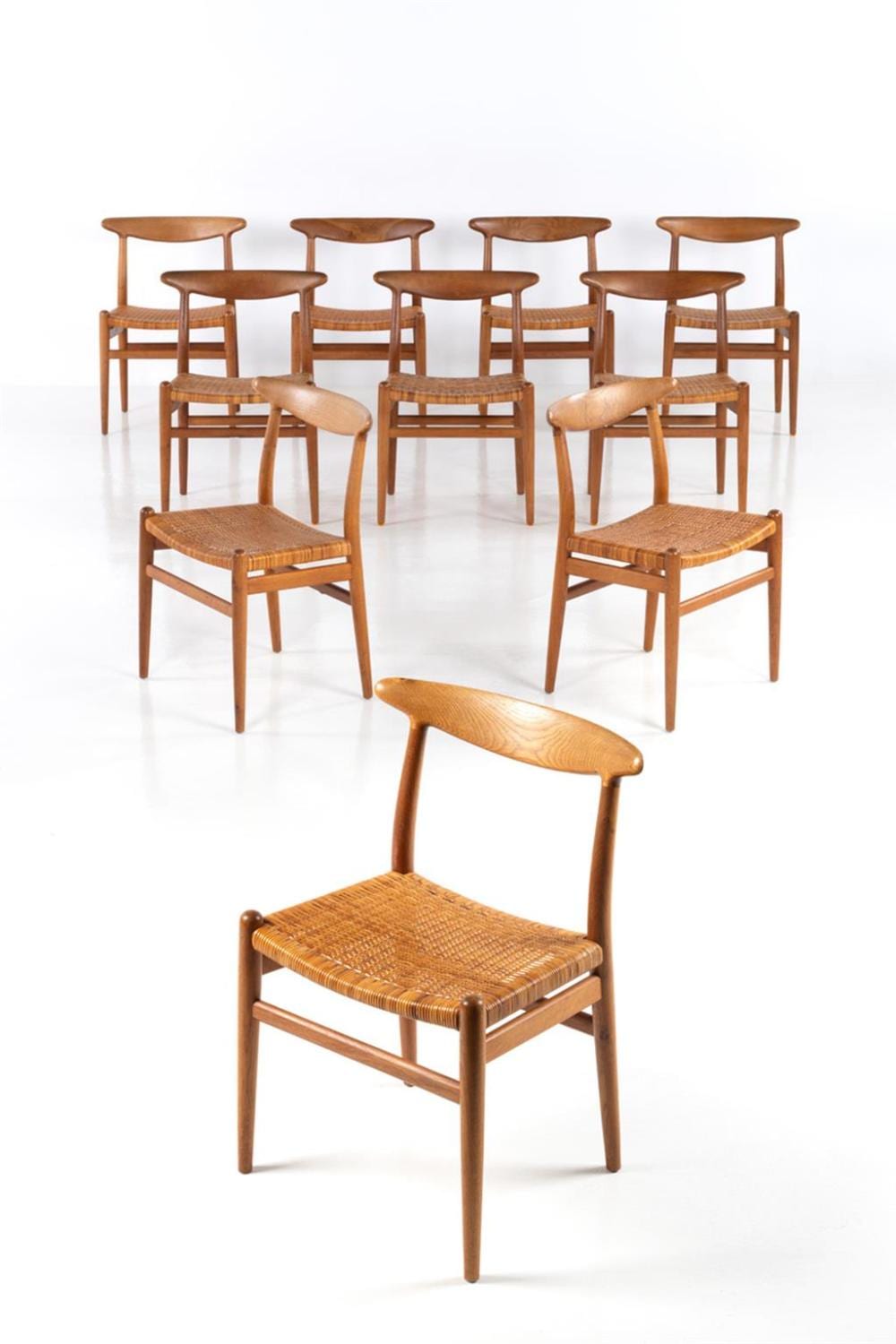 Hans J. Wegner comparable auction result: hans j wegner 1914 2007 set of ten chairs model w2