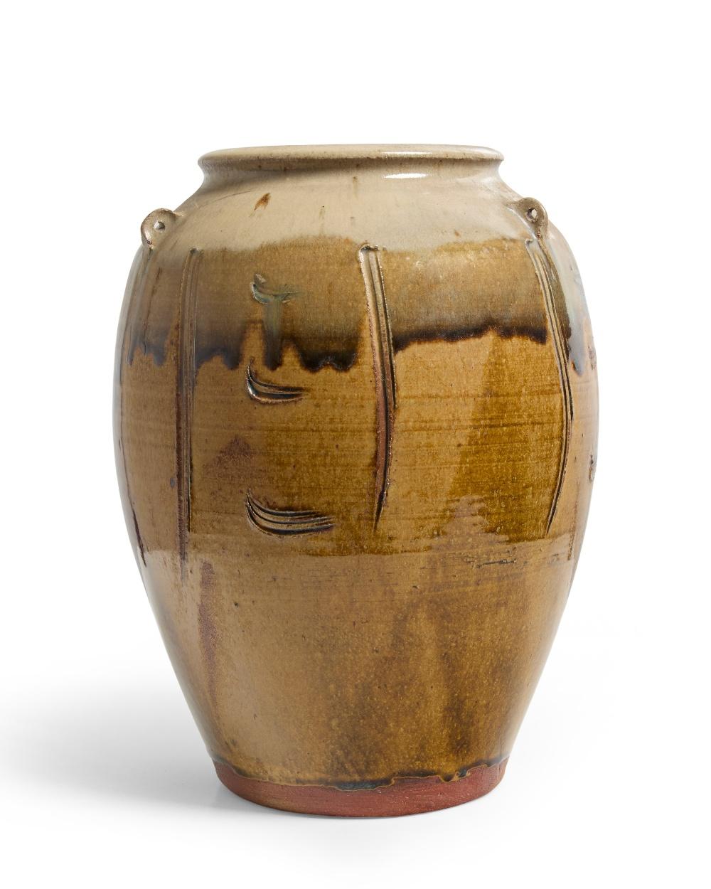Jim Malone comparable auction result: jim malone b 1958 tall lugged jar late 20th century stoneware with green ash g