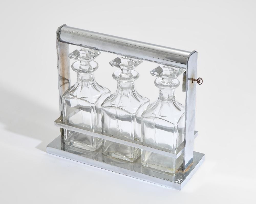 Jacques Adnet comparable auction result: jacques adnet 1900 1984 art deco tantalus with three decanters circa 1935 silve