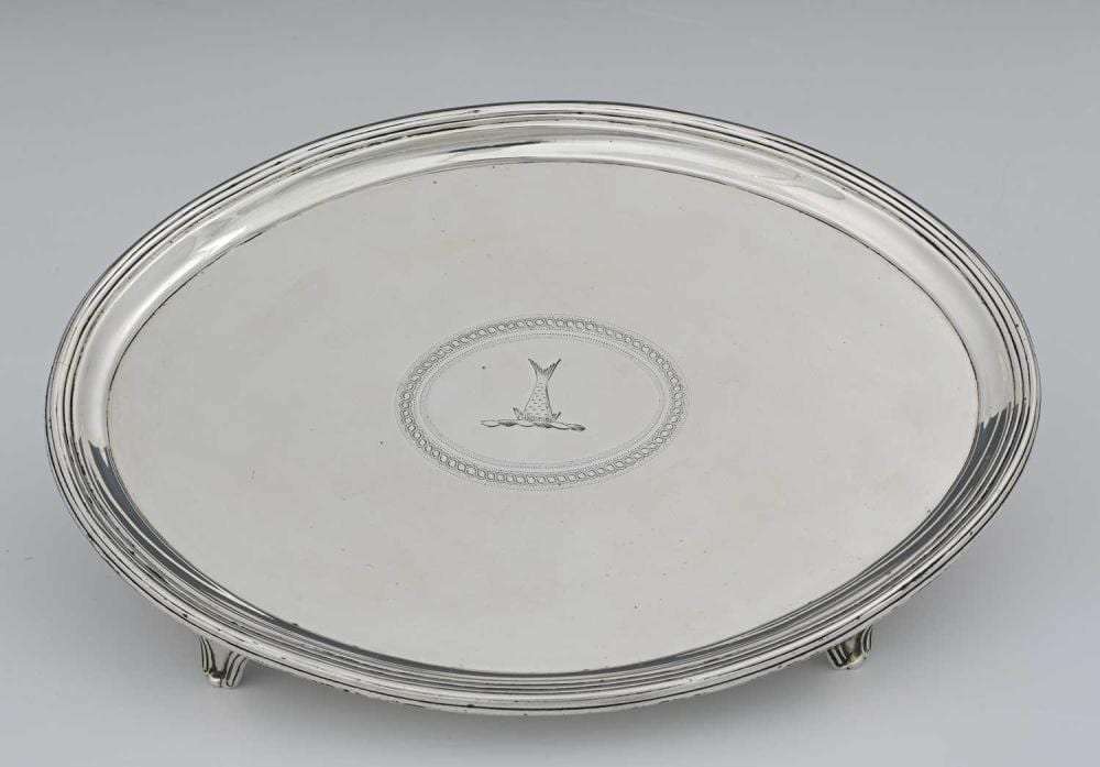 George (1930) Davis comparable auction result: a george iii silver teapot stand by geo