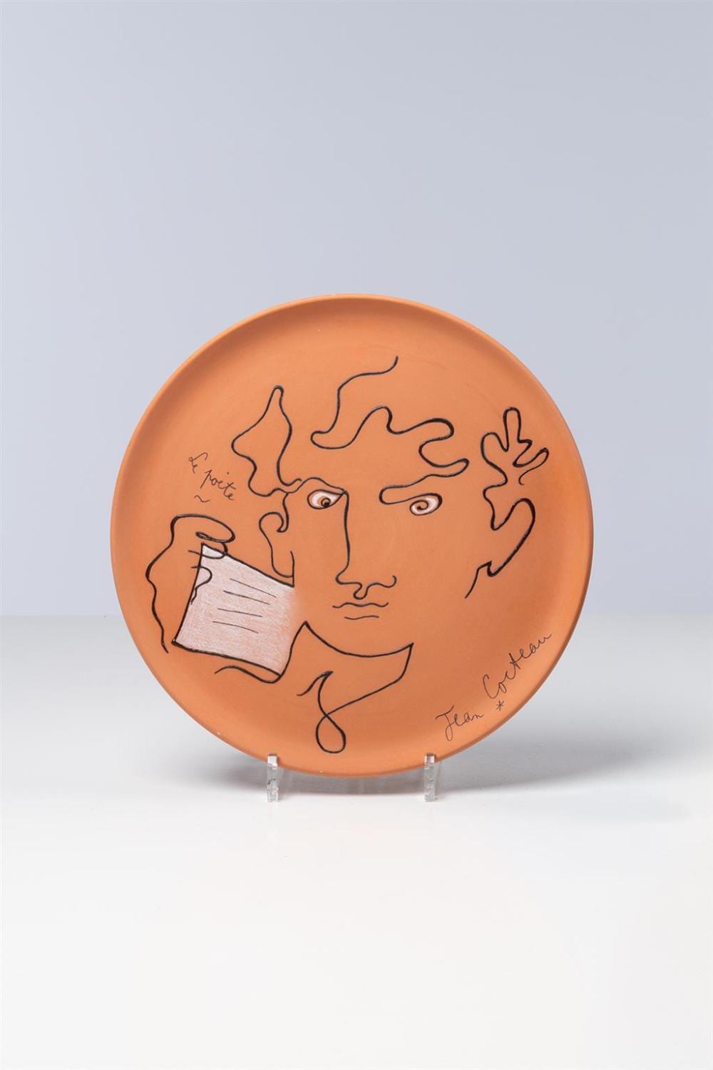 Jean Cocteau comparable auction result: jean cocteau 1889 1963 le po te author s copy dish red earthenware black and white oxide pencil and satin finish black enamel sig