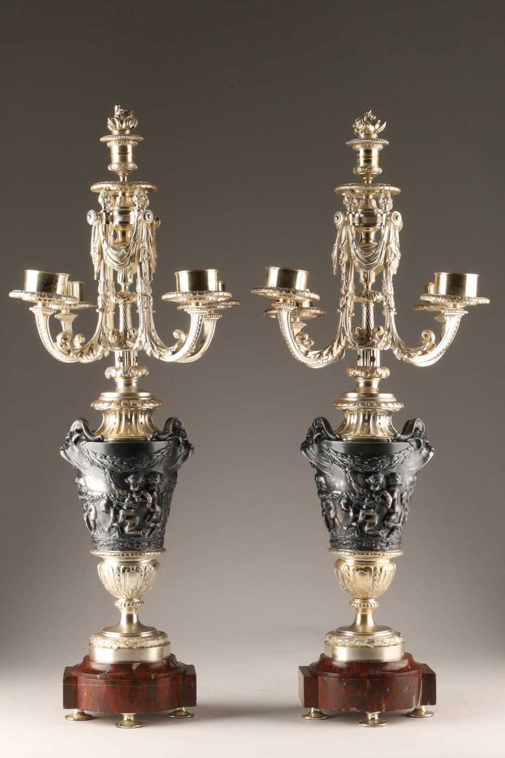 Clodion comparable auction result: pair of french neoclassical or louis xvi style candelabras after clodion