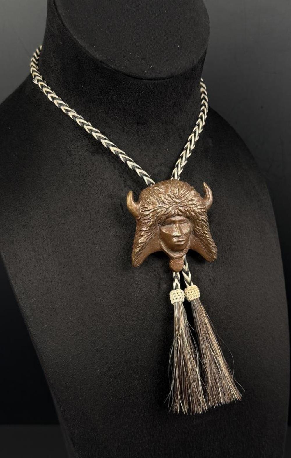 Allan Houser comparable auction result: allan houser 1994 prix de west bronze bolo tie
