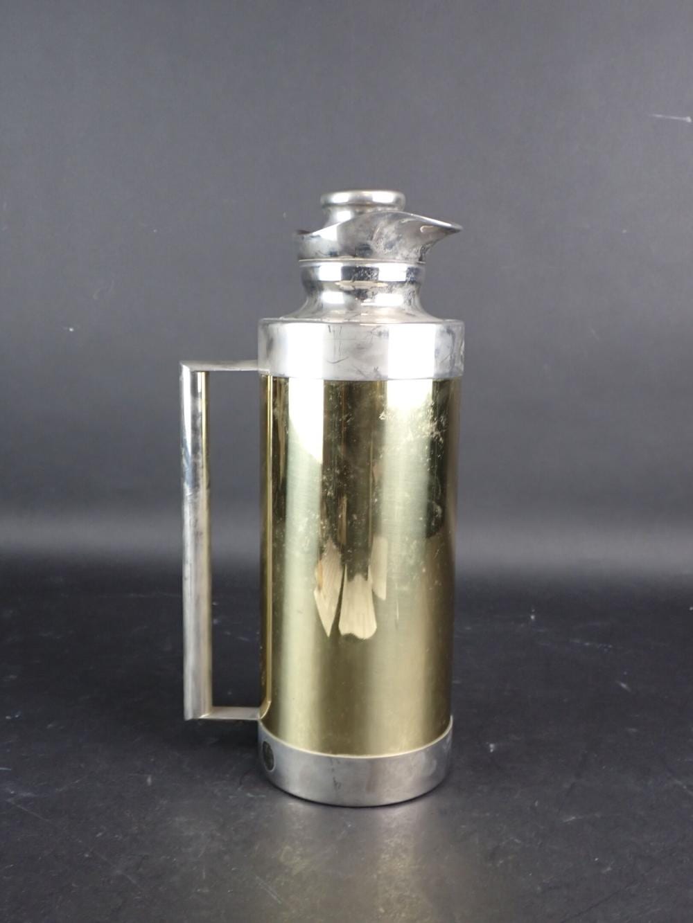 Christofle comparable auction result: christofle thermos en m tal argent uni