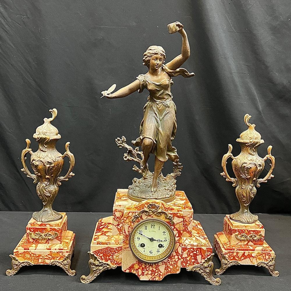 Ernest Rancoulet comparable auction result: l idee art nouveau figural mantel clock and urn garniture set after ernest rancoulet