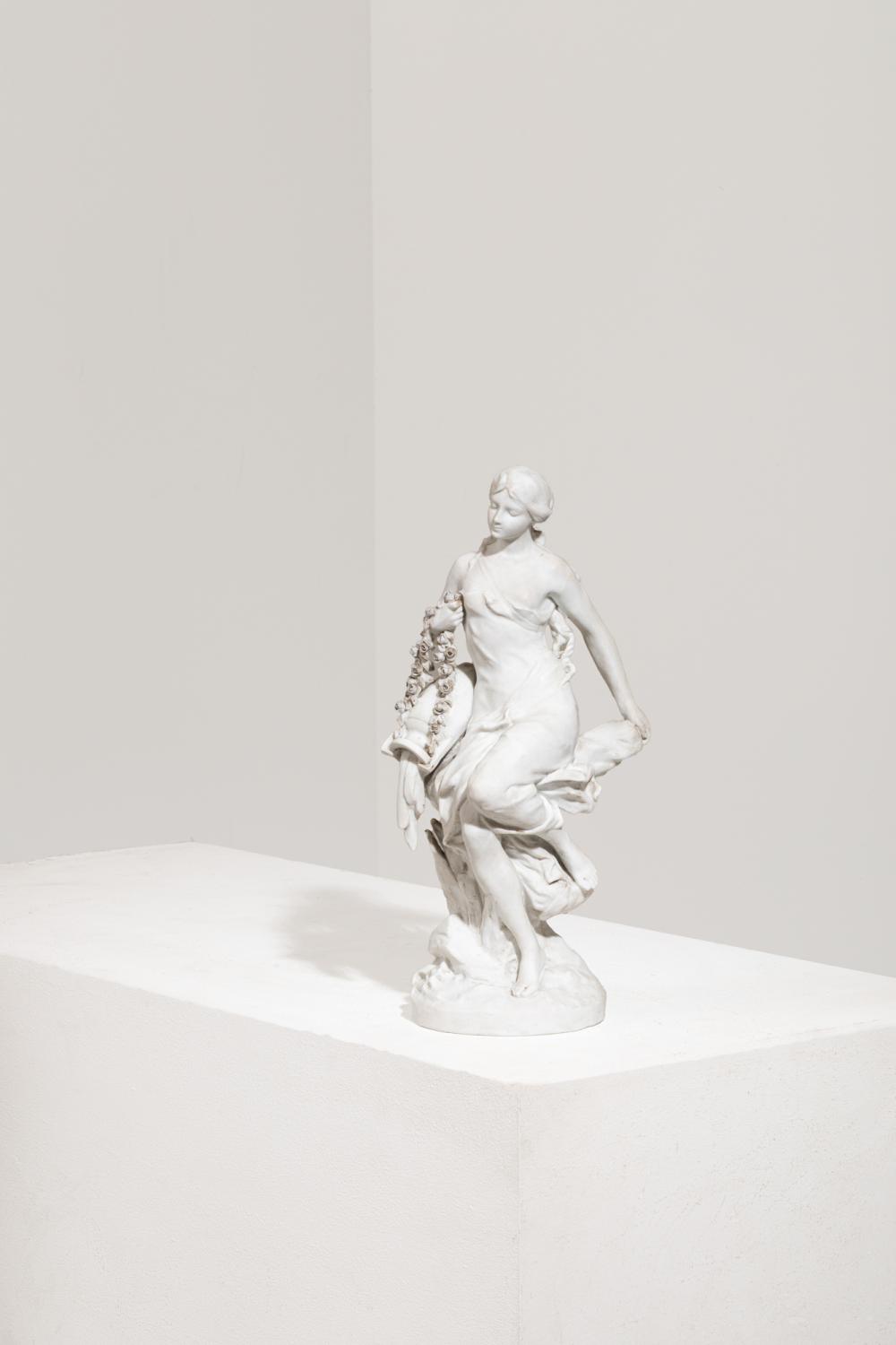 Edouard Drouot comparable auction result: edouard drouot 1859 1945 sculpture en biscuit figurant une femme la jarre aux guirlandes de roses