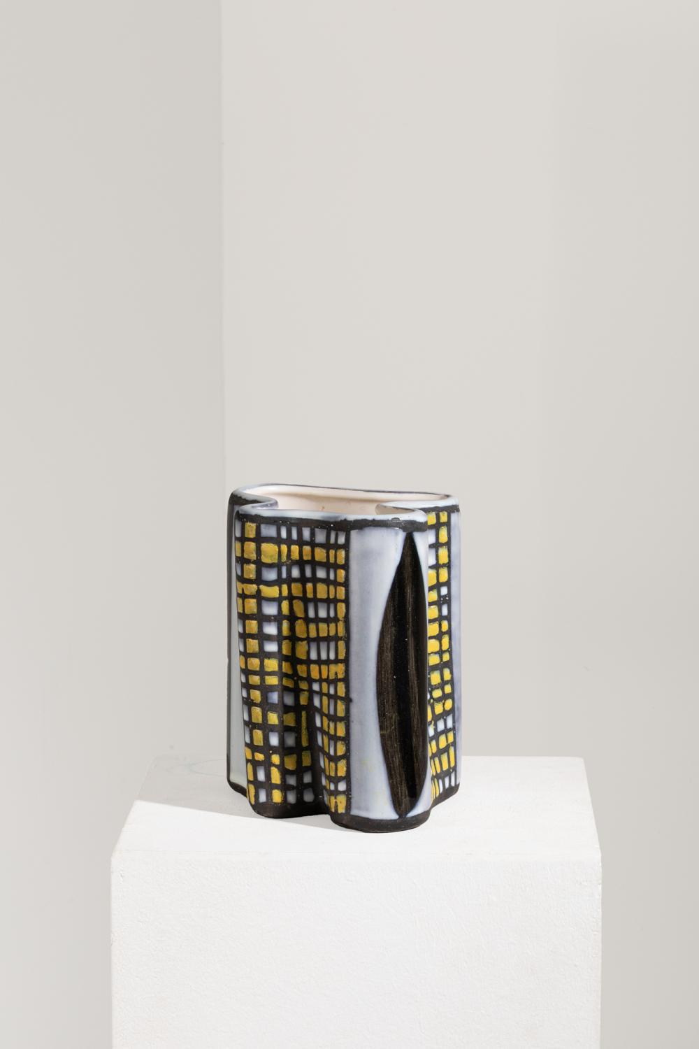 roger capron 1922 2006 vase de forme libre dit tr fle en c ramique maill e d cor de damier et de navettes grav et en r serve la paraffine · Gros-Delettrez · 2026-07-09 Roger Capron comparable auction result: roger capron 1922 2006 vase de forme libre dit tr fle en c ramique maill e d cor de damier et de navettes grav et en r serve la paraffine