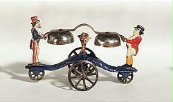 N. N. Hill Brass Co. Uncle Sam and John Bull cast iron Bell Toy, sold by Sotheby's, lot 86 — auction record photograph