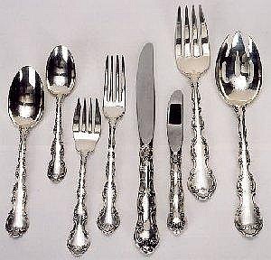 Auction comp thumbnail for GORHAM STERLING SILVER FLATWARE SET, service for 12, in the Strasbourg pattern of 1897, 53 total pieces including 12 dinner knives, 12 dinner forks, 12 salad forks, 12 teaspoons, 2 tablespoons, meat fork, pierced tablespoon and butter knife. Used (O'Gallerie, Lot 183)