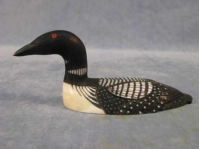 Larry Mayac comparable auction result: 5 5 white ivory common loon by larry mayac