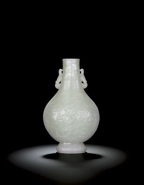 A Finely Carved And Very Rare White Jade 'Dragon' Vase Qing Dynasty, QIANLONG PERIOD comparable sale