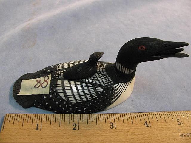 Larry Mayac comparable auction result: magnificent 5 5 white ivory common loon with
