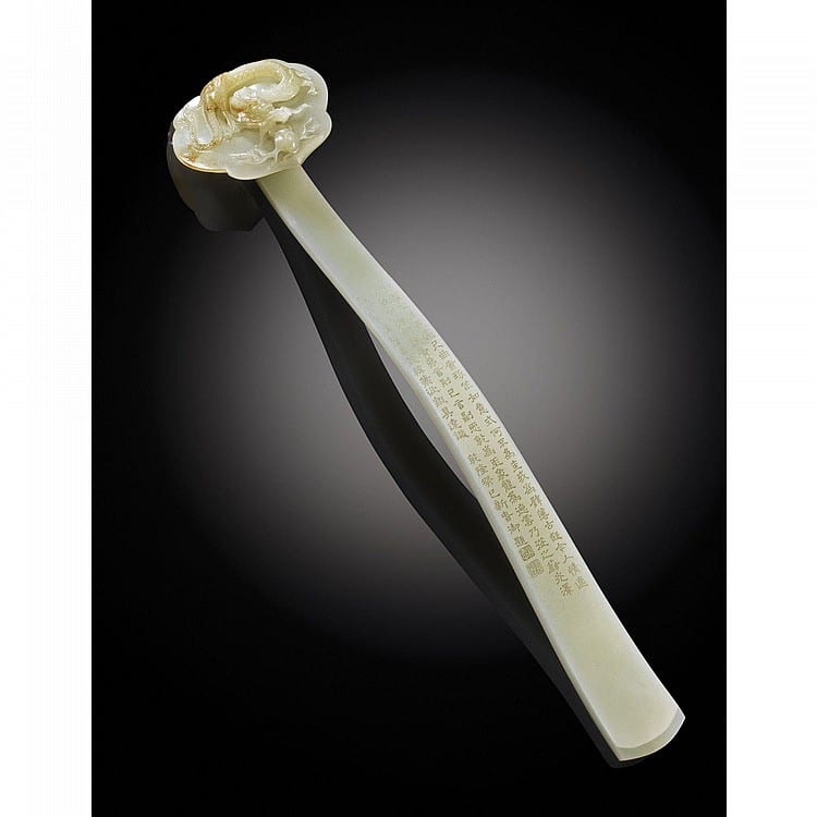 An Extremely Rare White Jade 'Dragon' Ruyi Sceptre With Imperial Poem Qing Dynasty, QIANLONG PERIOD, DATED TO THE GUISI YEAR (1773) comparable sale