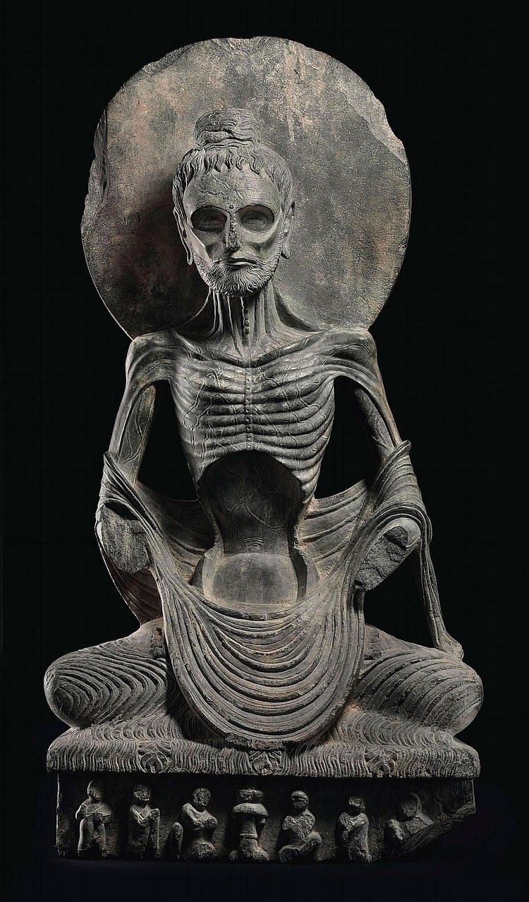 A highly important gray schist figure of the Emaciated Siddhartha, or 'Fasting Buddha' comparable sale