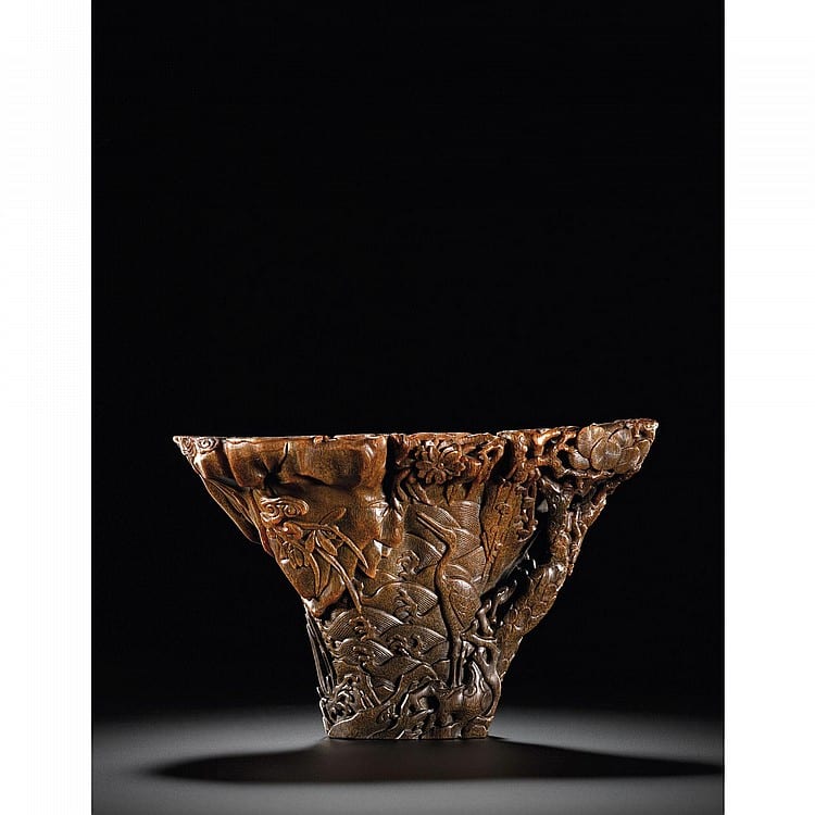 A Large Rhinoceros Horn Libation Cup WITH CRANES 17TH CENTURY comparable sale