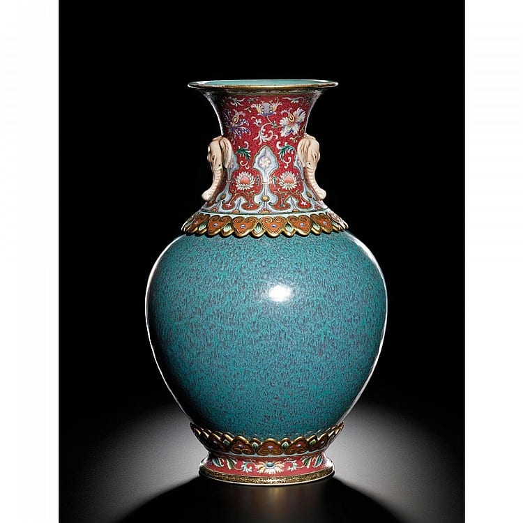 An Extremely Rare And Magnificent Robin'S EGG AND FAMILLE-ROSE REVOLVING VASE SEAL MARK AND PERIOD OF QIANLONG comparable sale