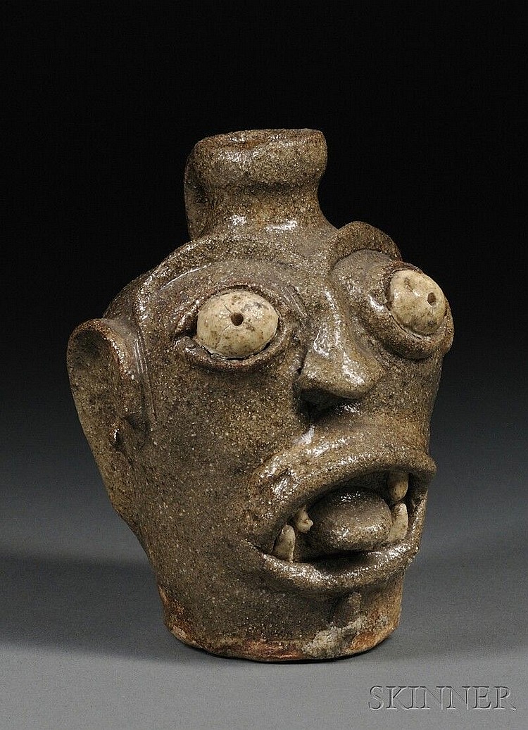 Stoneware Face Jug, attributed to Bath, (Aiken County), South Carolina, area, second half 19th century, alkaline glazed jug with modele sold by Skinner, lot 287 — auction record photograph
