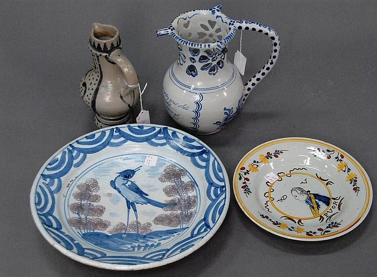 Four piece lot to include Delft plate and drinking pitcher, stoneware, ewer, and earthenware plate. sold by Nadeau's Auction Gallery, lot 241 — auction record photograph