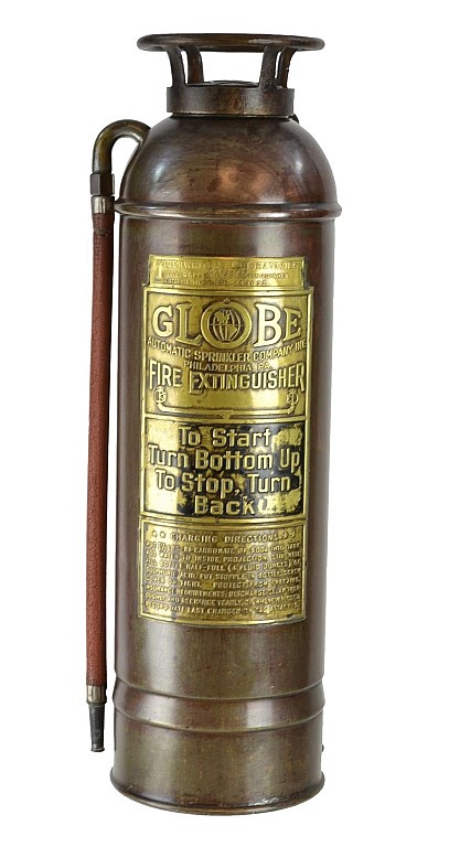 Antique-style metal fire extinguisher with a carrying handle and a gold label panel reading “GLOBE” and “FIRE EXTINGUISHER.”