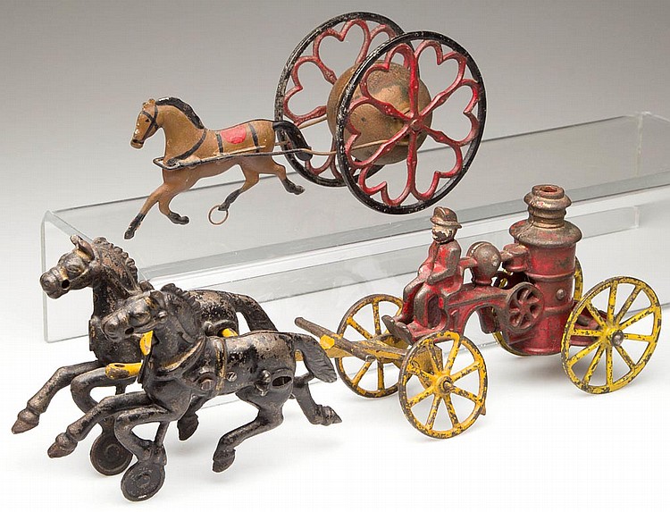 CAST-IRON HORSE-DRAWN TOYS, LOT OF TWO sold by Jeffrey S. Evans & Associates, lot 659 — auction record photograph