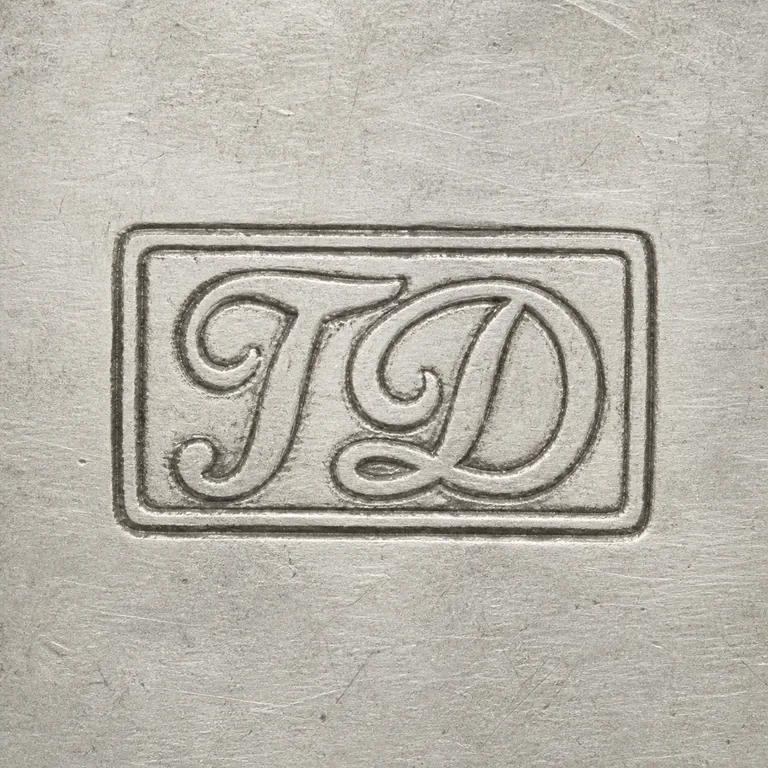 Thomas Dealtry: Interlaced TD-like forms within a double rectangular cartouche, rendered square; oxidized reconstruction.