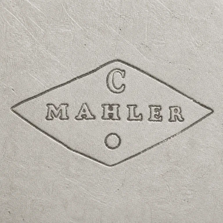 Maison Cardeilhac: Horizontal diamond punch with C above, MAHLER across the center, and one dot below; oxidized reconstruction.