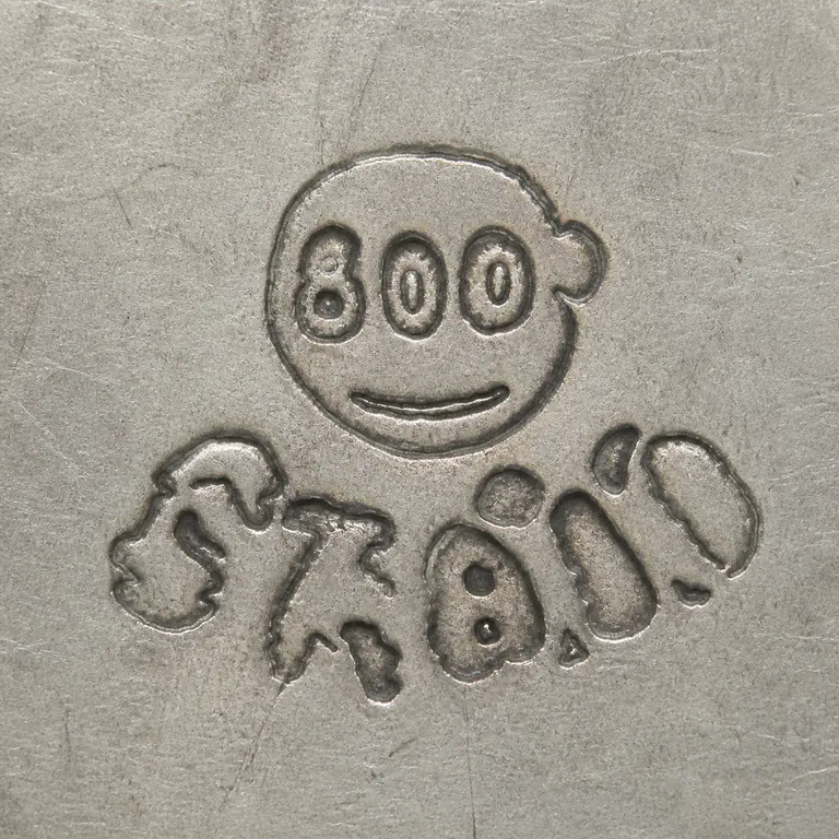 Typical Yogya Silver Marks: The upper irregular circle now contains exactly 800 and a lower curved fragment; five lower punch clusters remain in a shallow arc as inc…; oxidized reconstruction.