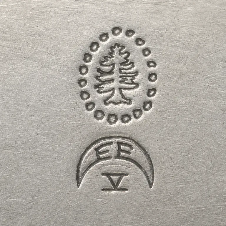 Tuttle Silversmiths: pine tree; oxidized reconstruction.