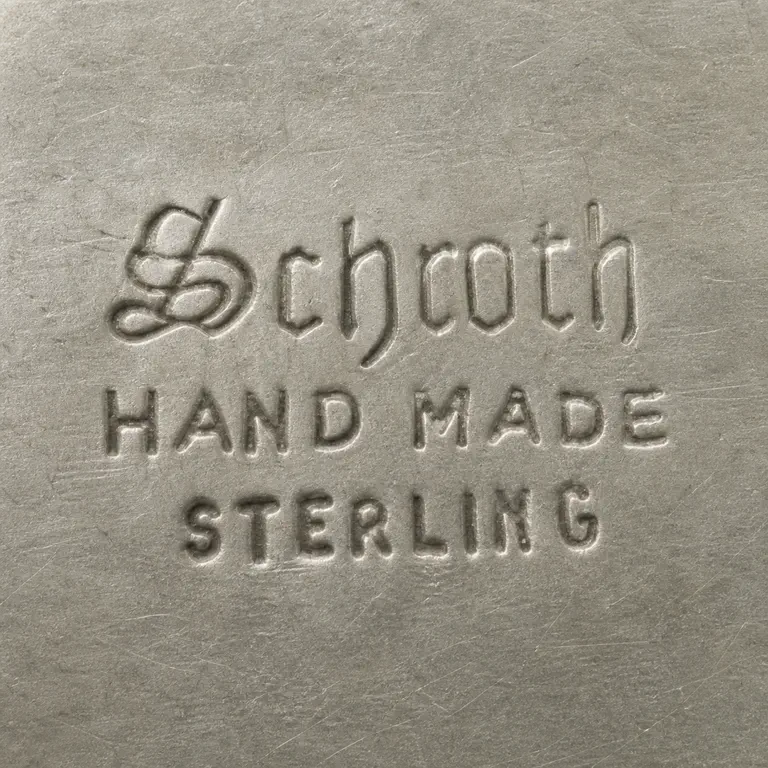 Schroth Jewelers: Schroth, Hand Made, Sterling; oxidized reconstruction.