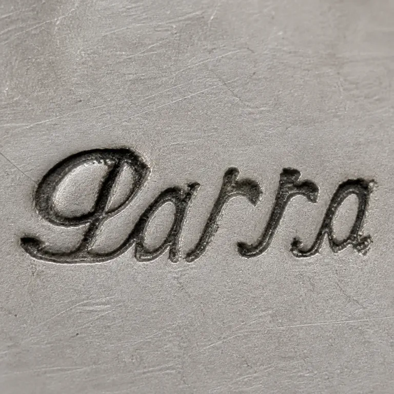 Horacio de la Parra: One horizontal cursive word mark reads Parra, beginning with a large looped P and continuing through joined lower-case letters; oxidized reconstruction.