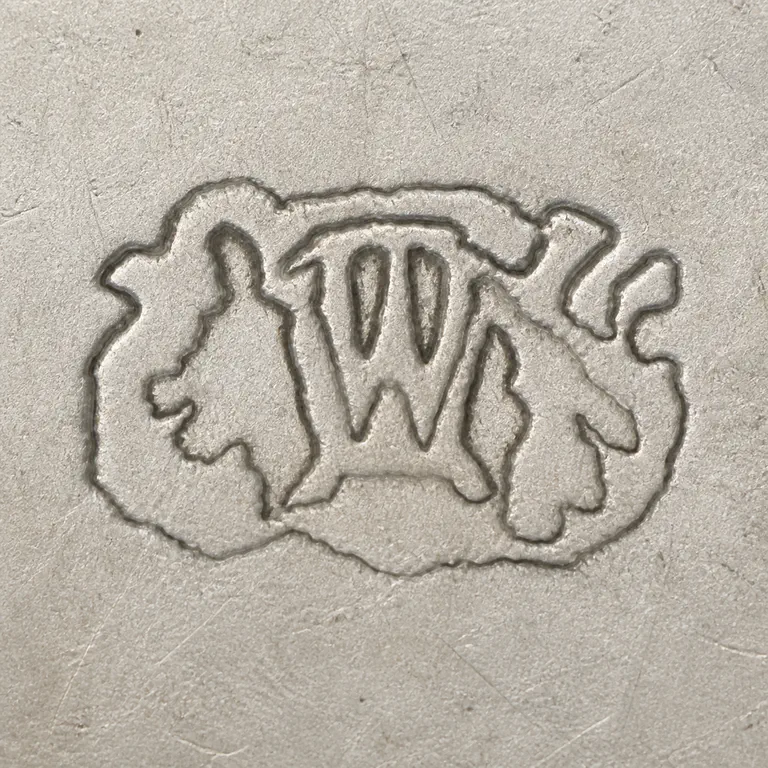 Wendell Manufacturing Co.: W, Lions; oxidized reconstruction.