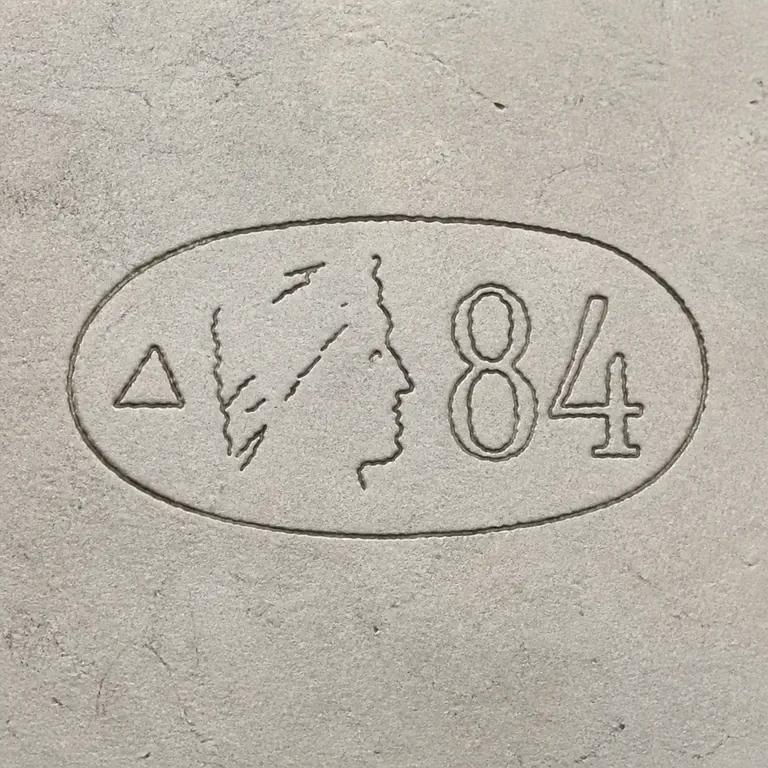 St. Petersburg: One horizontal oval with one hollow triangle at left, sparse worn right-facing profile contours in the center, and 84 at right; oxidized reconstruction.