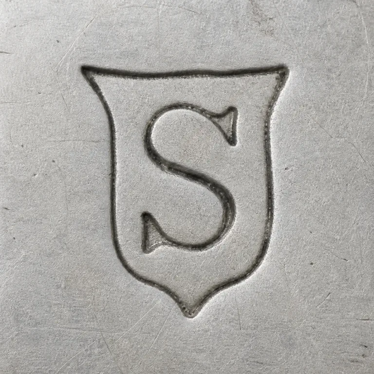 Simons Brothers: S,shield; oxidized reconstruction.