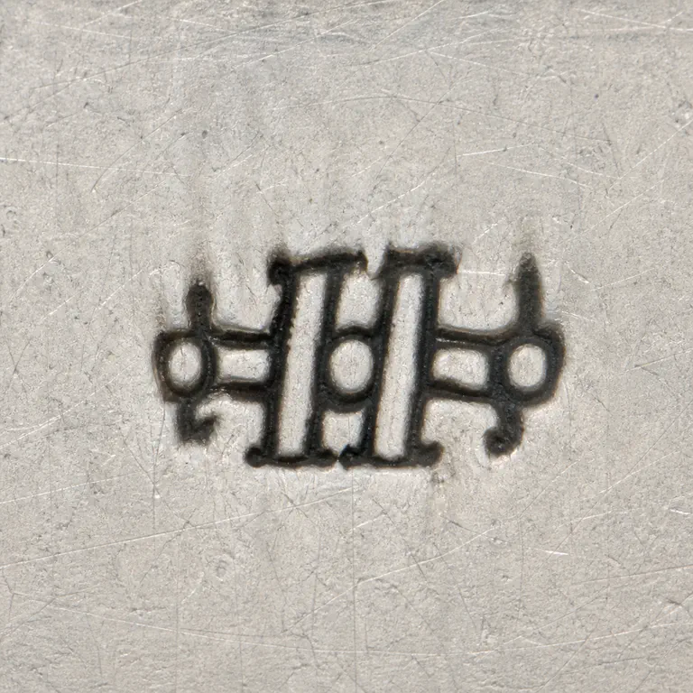 George A. Henckel & Co.: H; oxidized reconstruction.