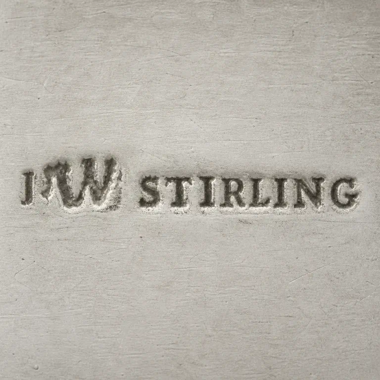John Warner, Stirling , Cork: JW followed by STIRLING on one worn horizontal line without a clearly separate enclosing cartouche; preserve the visible maker initials a…; oxidized reconstruction.