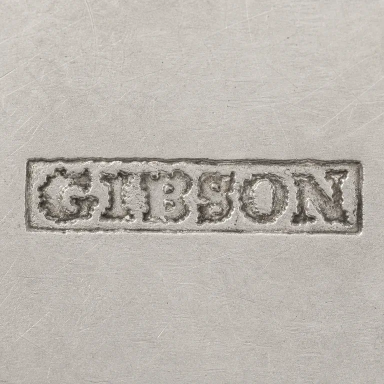 Silversmith: GIBSON; oxidized reconstruction.